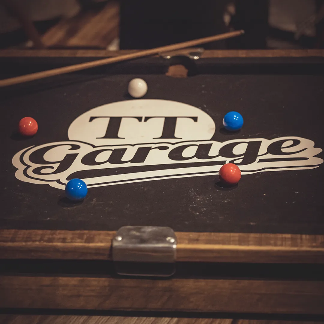 TT Garage, pool table with logo